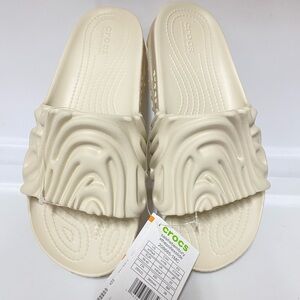 CROCS Wave-Textured Slide Sandals in Cream